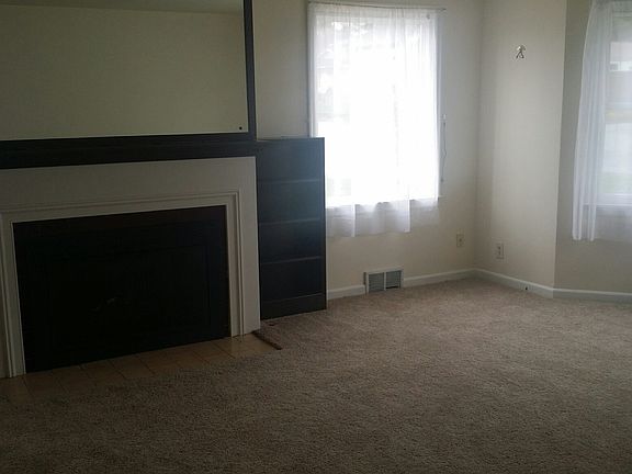 living room with gas fireplace