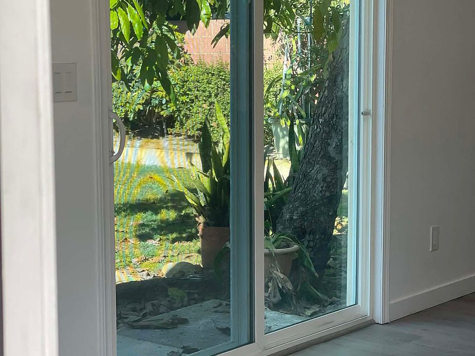 Main sliding door that goes through shared backyard. This ADU rental is fully detached from the main house, giving you plenty of privacy. Gardening service included =)