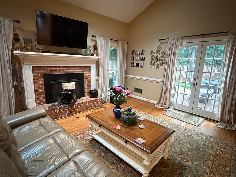 2 story living room with Mendota gas firesplace and sky lights