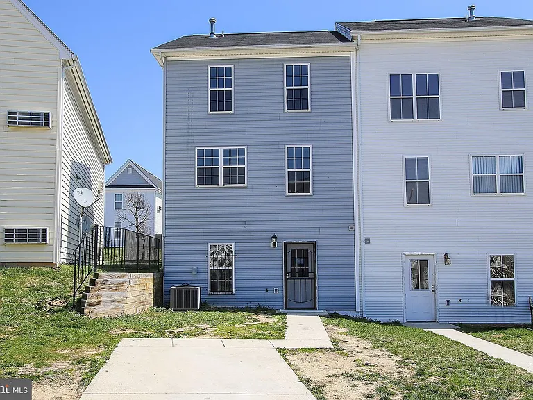 Back of house and parking spot.