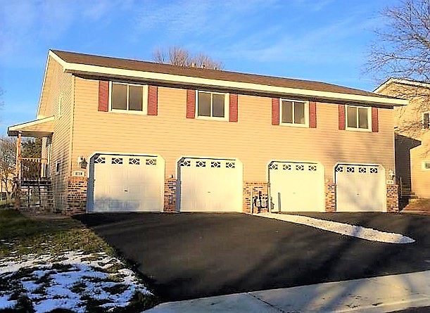Two car garage with large driveway