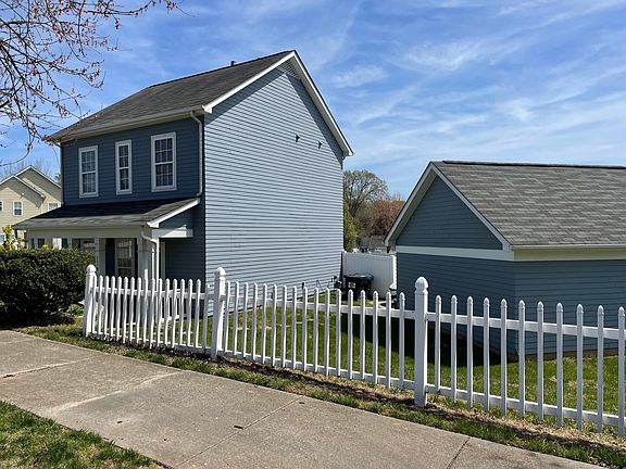Picket fence and privacy fence, 2 car detached garage.