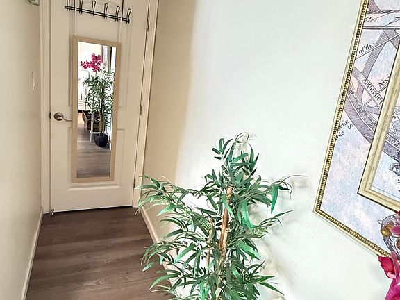 It has a hall way with mirror for your dressing up daily