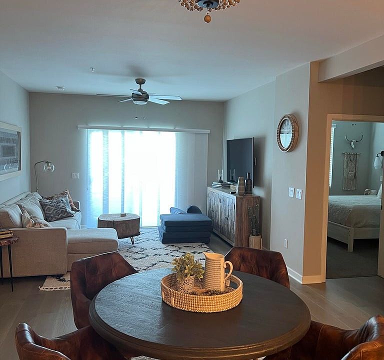 Living area right off of dining area. Beautiful view from patio.