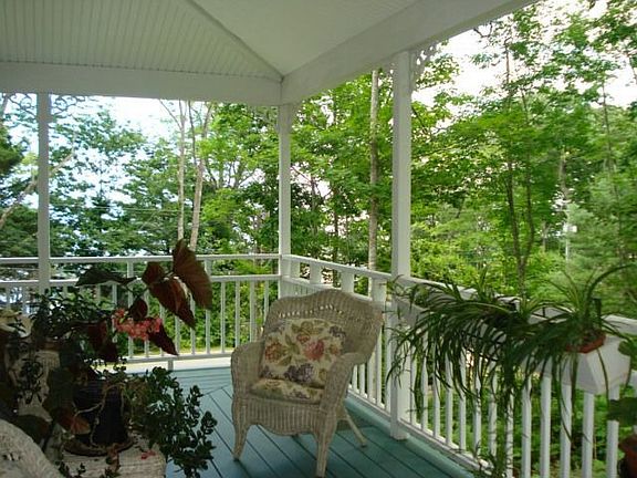 Covered porch with paddle fans and best of all, Water Views!