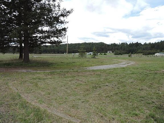 VIEW FROM THE FRONT AREA OF HOUSE LOOKING OVER DRI