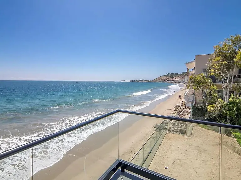 Glass wrap around balcony providing clear views