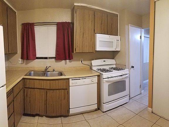 Kitchen includes a brand new refrigerator