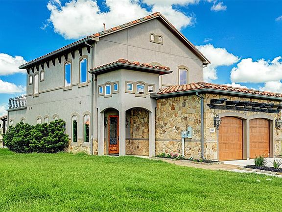 BEAUTIFUL MEDITERRANEAN ARCHITECTURE WITH STONE AND STUCCO ELEVATION.
