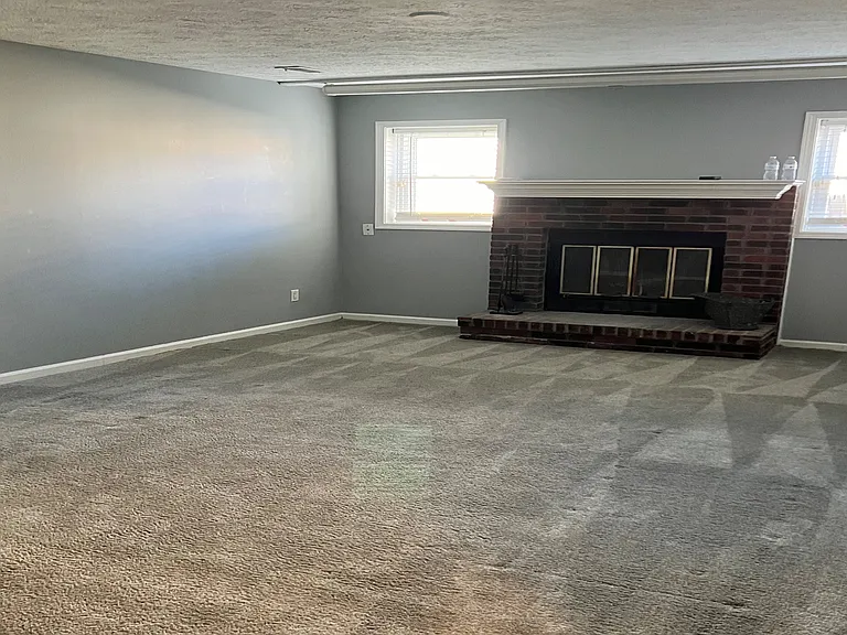 Living room with fire place on lower level
