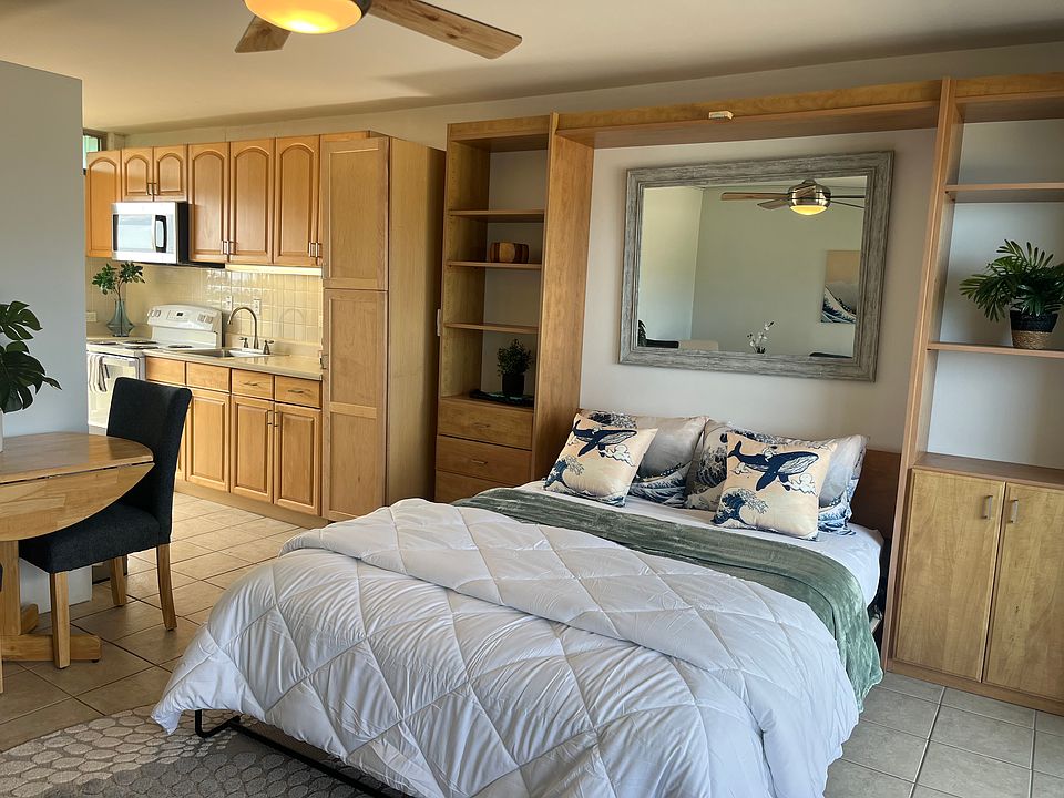 View toward kitchen, bathroom and entryway.