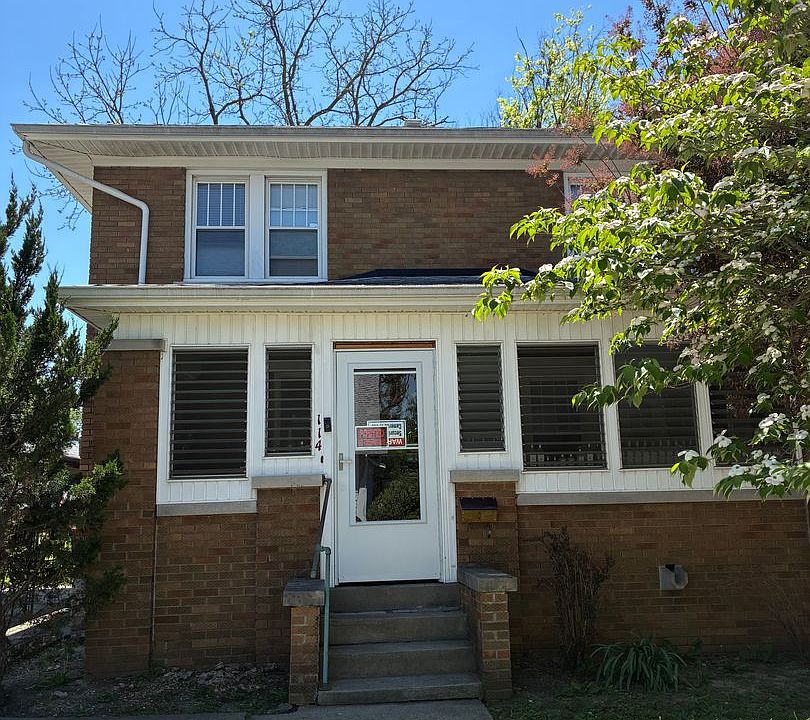 1st image of 114 E 1st St