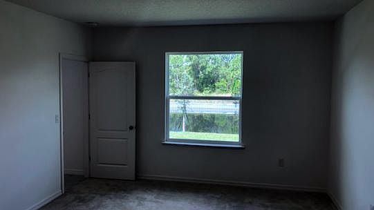 Spacious master bedroom overlooking the huge backyard and CA
