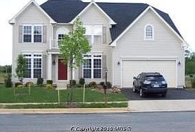 COLONIAL WITH 2 CAR GARAGE