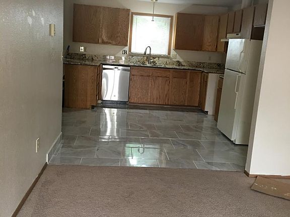 Living room from entrance to kitchen/dinning open area