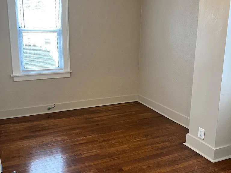 Bedroom w Hardwoods