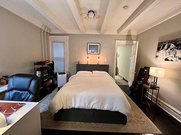 Bedroom between living room and kitchen