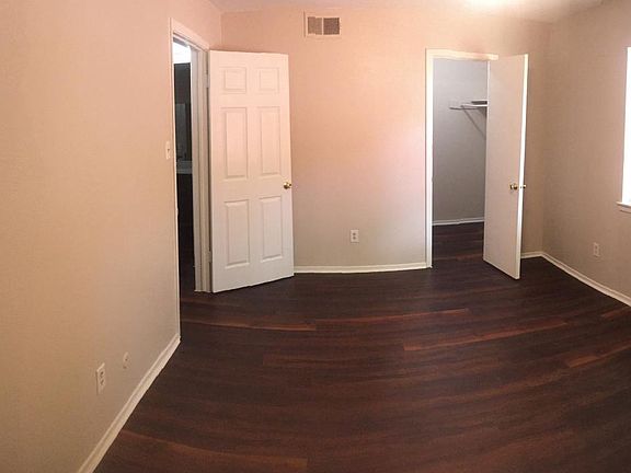 Large bedroom with two walk in closets.