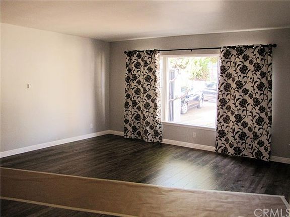 spacious living room with large picture window