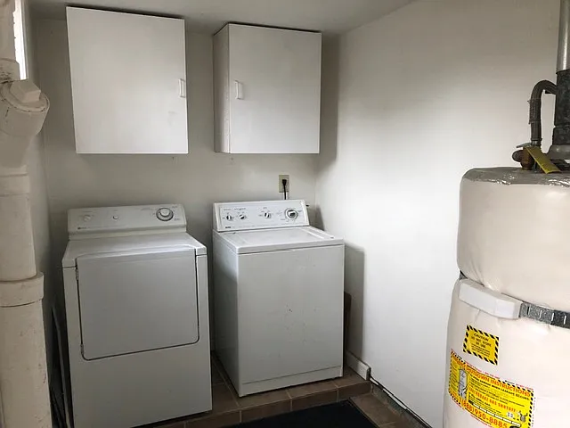 Shared laundry, separated entrance from upstairs unit.