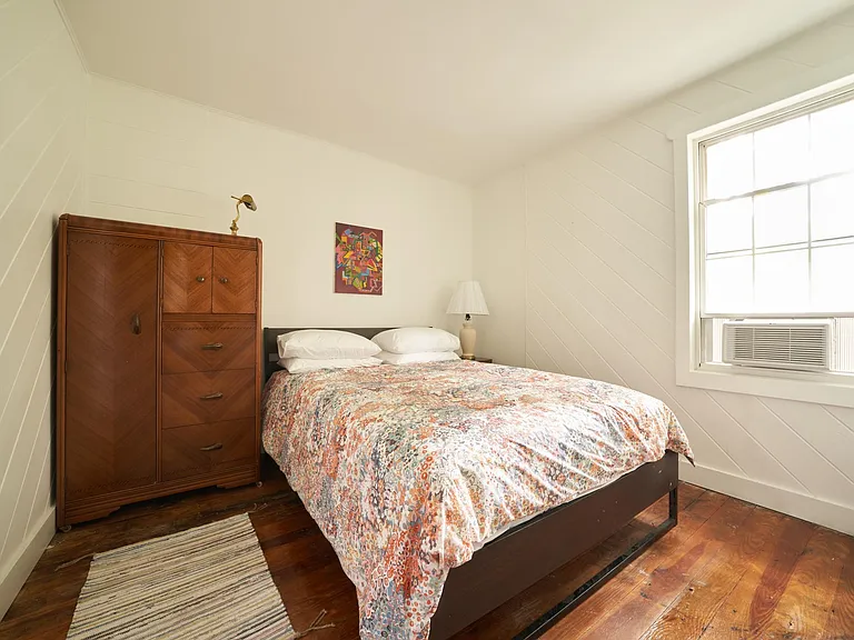 Bedroom 3. Armoire can stay for closet if tenant likes.