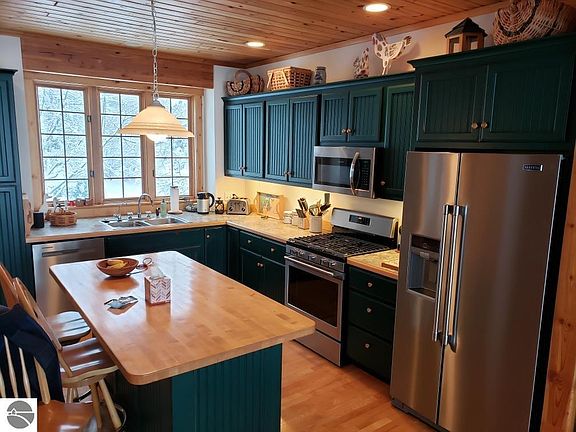 4th image of 8431 Drake Ln