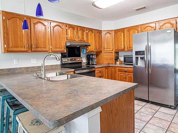 2nd image of 9448 E River Dr