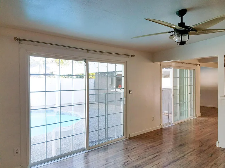 Natural light galore with these patio doors throughout living space!