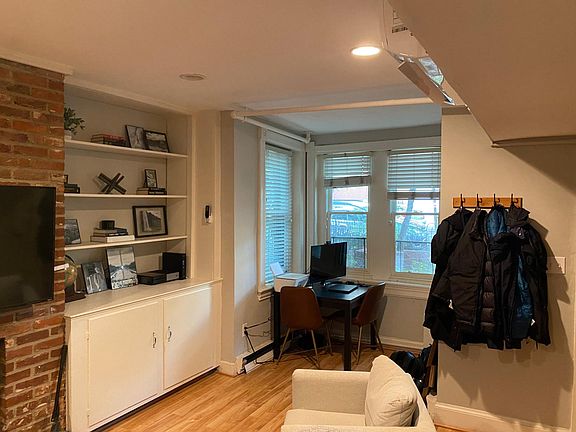 Main room with view toward front of home.