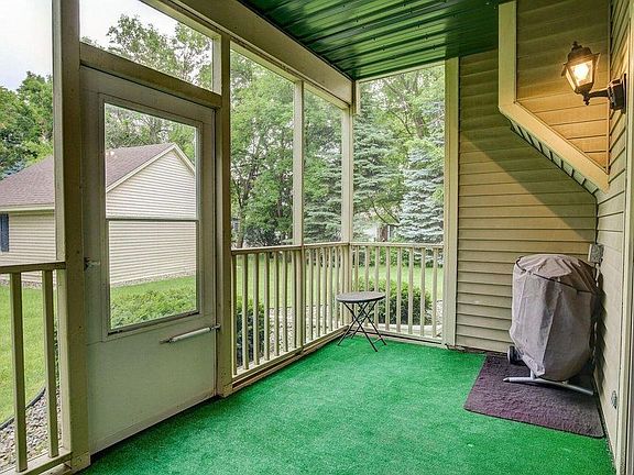 Screened porch off kitchen and living room