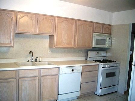 5th image of 4944 N Ozanam Ave