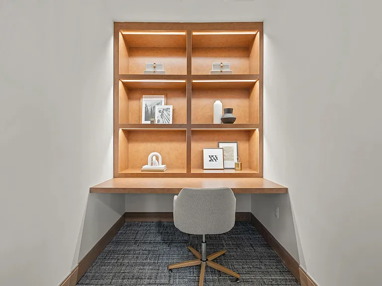 Private meeting rooms and coworking spaces with comfortable seating.