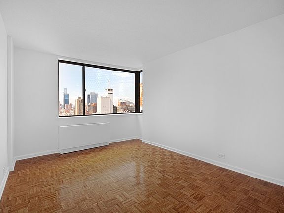 5th image of 124 W 60th St APT 18E