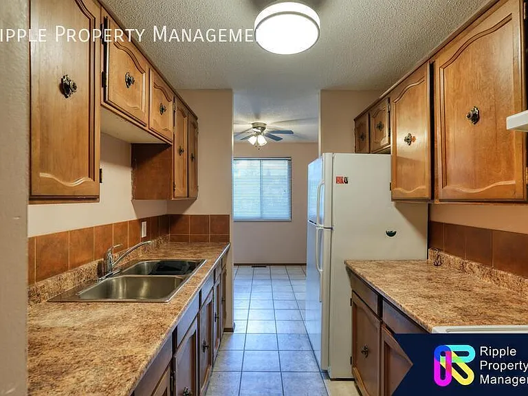 7712 Bowness Rd NW #E — Photo 3