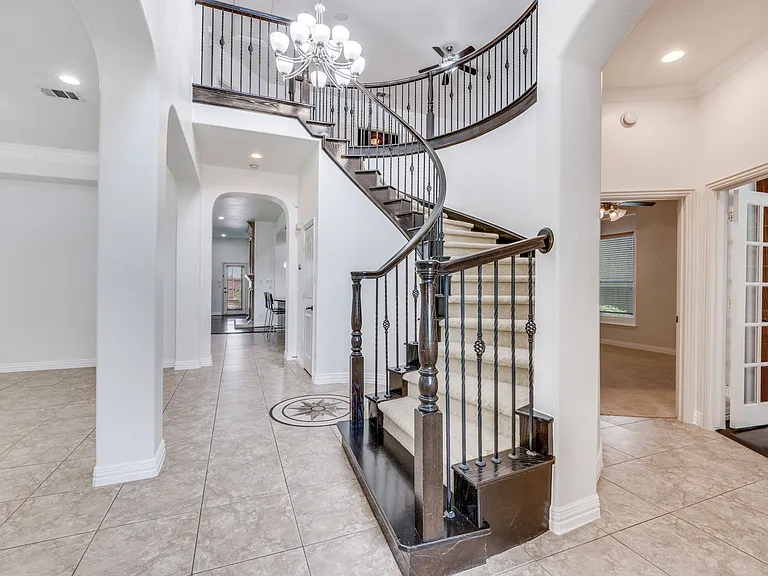 Entry hall with living & dining on the left. All photos were taken before the last tenant moved in. Currently occupied thru 9/30.