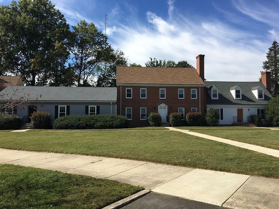 227 Brookwood is the light blue single story rancher.