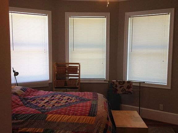 Bedroom w/ original hardwood floors