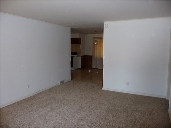 LIVING ROOM LOOKING AT KITCHEN