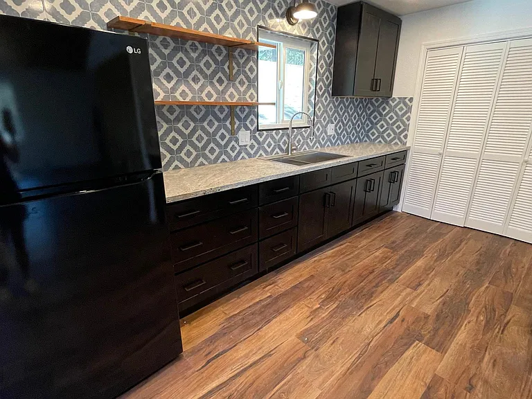 Tile to ceiling.