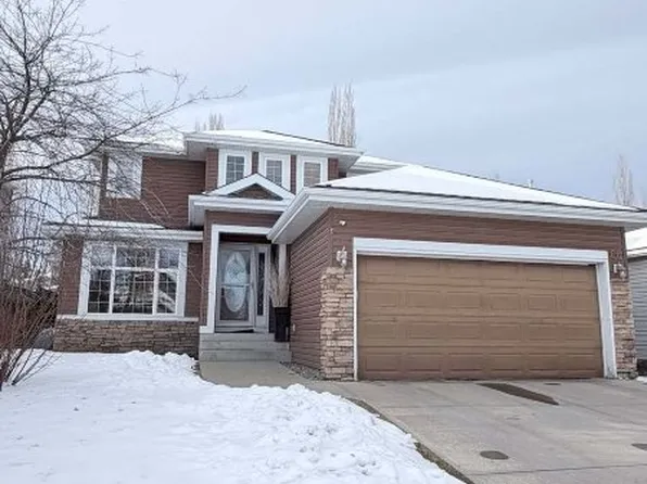 66 Royal Highland Rd NW, Calgary, AB T3G 4Y4