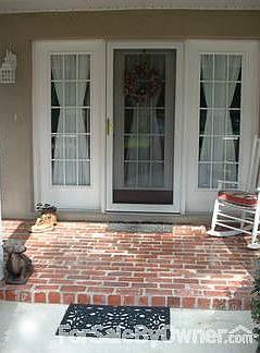 Front Porch with Real Brick Pavers
						:
						Rock away those sunny days