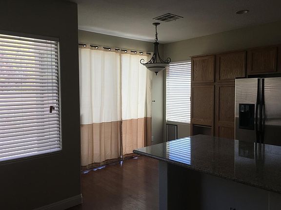 Sliding glass door next to kitchen