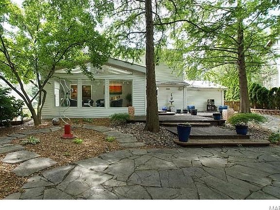 View of flagstone patios & multi-level decks