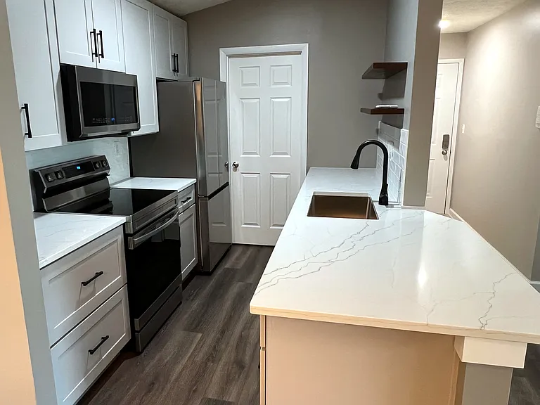 Remodeled Kitchen with New Cabinets, Subway Tiles & Beautiful White Granite Countertops
