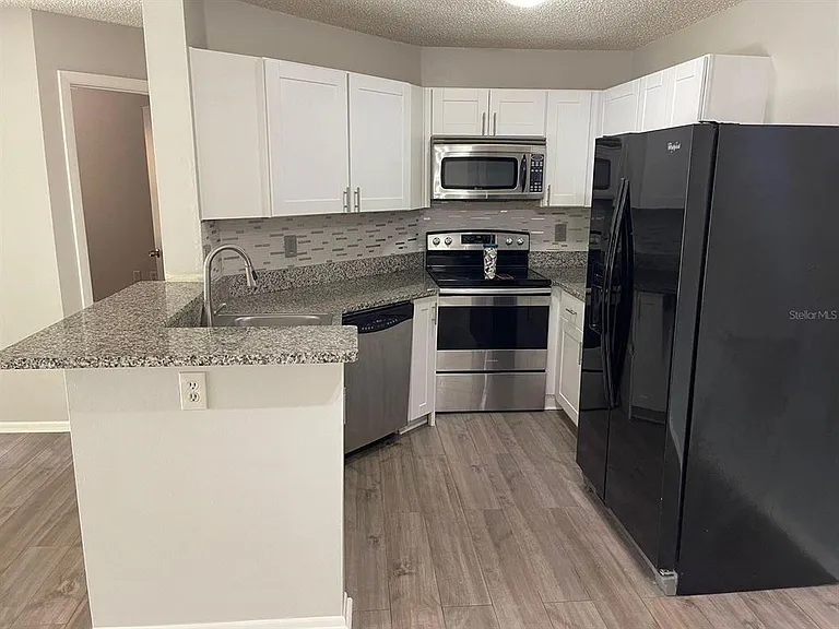 2564 Grassy Point Dr #100 — Photo 3