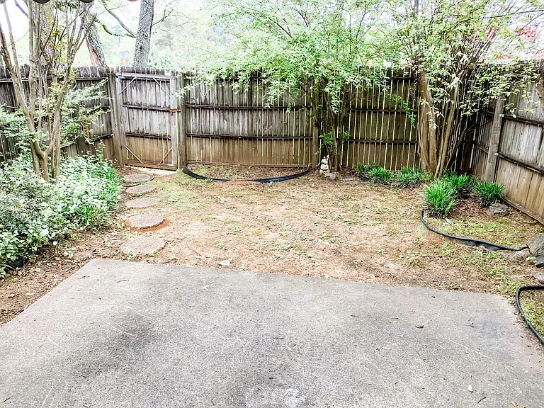 Exterior patio with private backyard