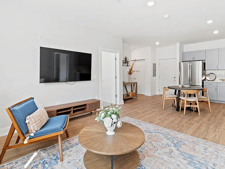 Experience the charm of this beautifully designed open-concept living area, perfect for relaxation and dining.