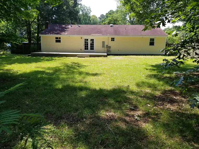 huge fence-enclosed backyard