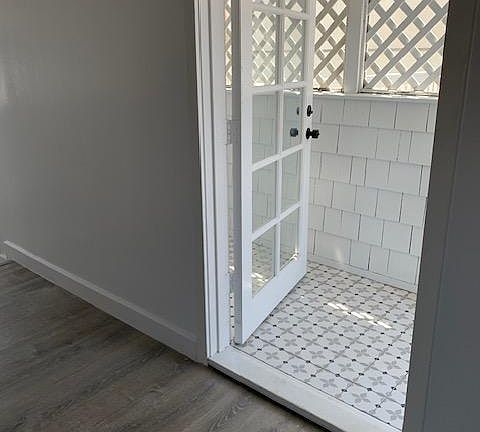 Entry-way to main room.