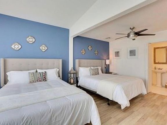 Second bedroom with two queen-sized beds